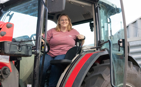 Teresa Brandenburg on her Kansas farm tractor