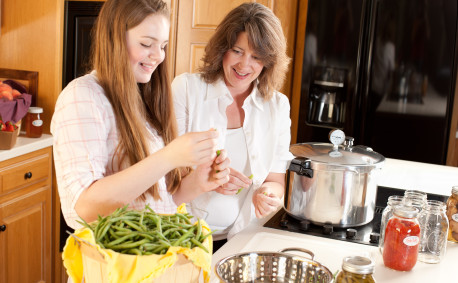 Mother and Daughter with Pressure Cooker